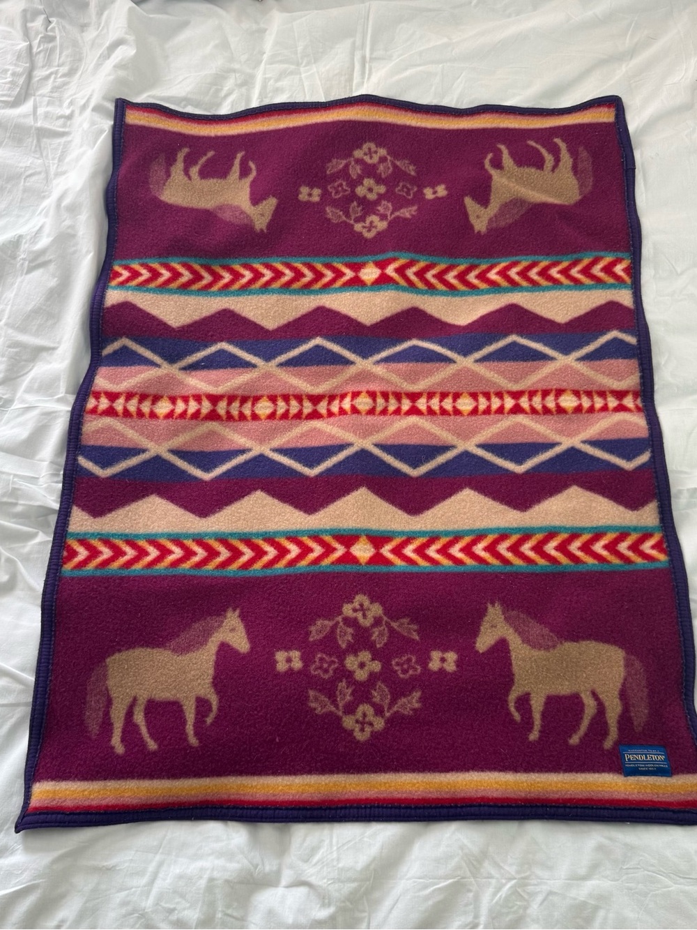 Pendleton Purple Horse Motif Fleece Throw with Multicolor Geometric Stripes